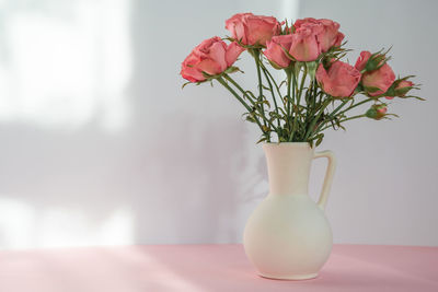 Close-up of flower vase on table