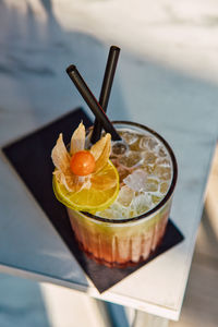 High angle view of drink in glass on table