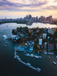 Aerial view of city at sunset