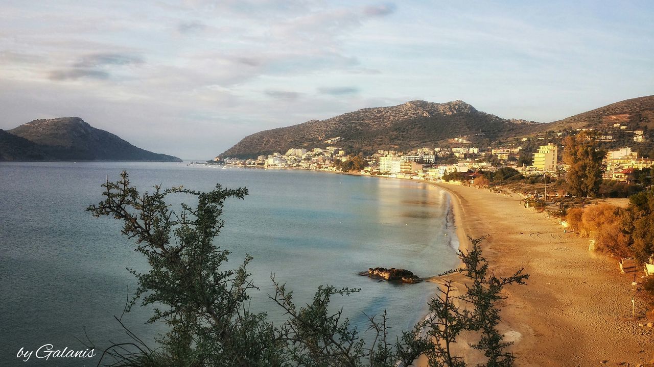 PANORAMIC VIEW OF LAKE AND MOUNTAINS AGAINST SKY