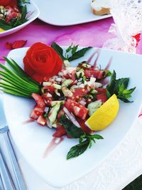 High angle view of fruits in plate on table