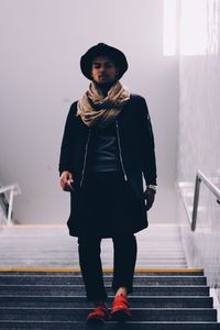 Low angle view of man standing on steps