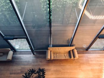 High angle view of chairs on floor at home