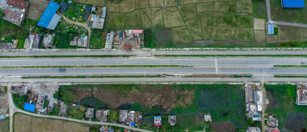 High angle view of cars on road in city