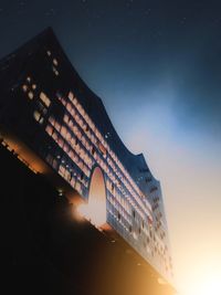 Low angle view of building against sky at night