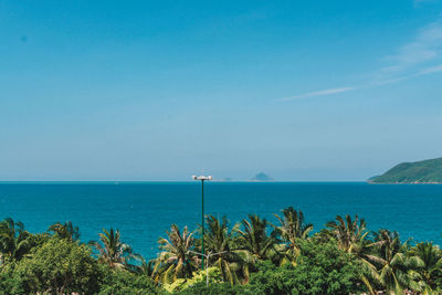 Scenic view of sea against clear blue sky