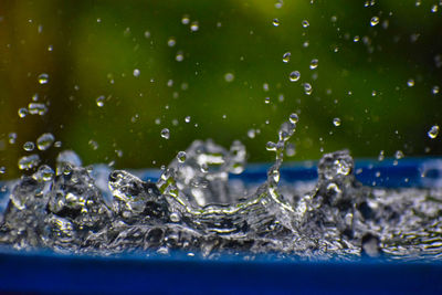 Close-up of water splashing on sea