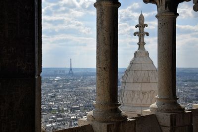 View of city against cloudy sky