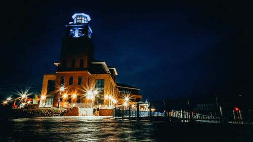 Illuminated building at night