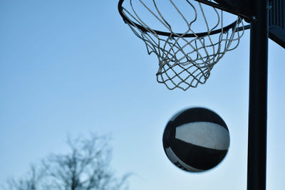 Low angle view of basketball hoop against sky