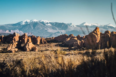 Panoramic view of snowcapped mountains against sky