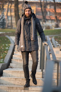 Portrait of young man standing outdoors