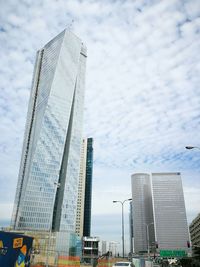 Low angle view of skyscrapers against sky