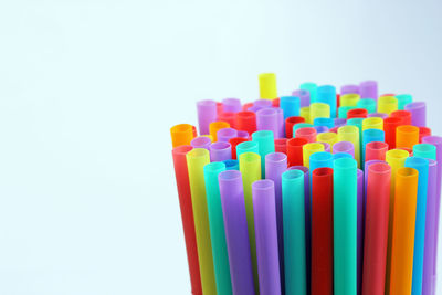 Close-up of colored pencils against white background