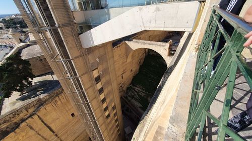 High angle view of bridge amidst buildings in city