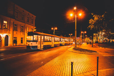 Illuminated street at night