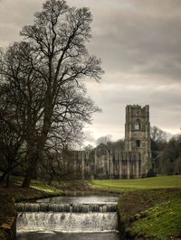 View of historic building against cloudy sky