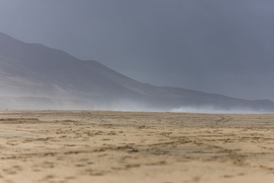 Scenic view of desert against sky