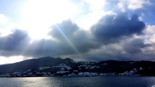 Scenic view of mountains against cloudy sky