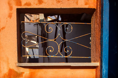 Close-up of metal window on wall