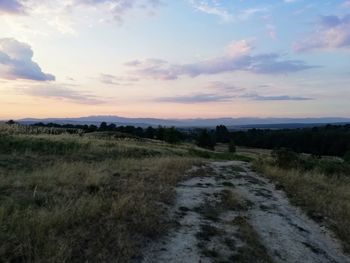 Scenic view of landscape against sky during sunset