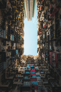 Low angle view of buildings in city against sky