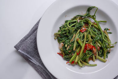 High angle view of salad in plate on table