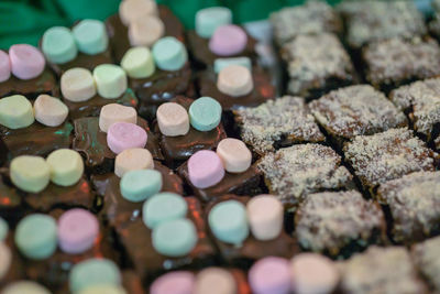 High angle view of multi colored stones on table