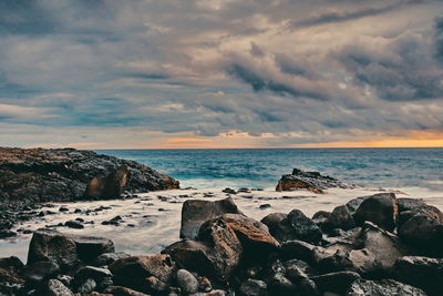 Scenic view of sea against sky during sunset