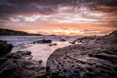 Scenic view of sea against sky during sunset