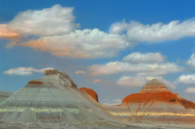 Scenic view of mountain against cloudy sky