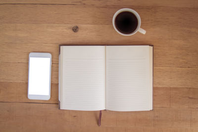 Directly above shot of coffee cup on table
