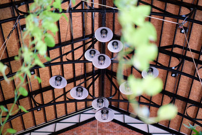 High angle view of clock hanging on ceiling