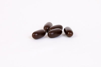 Close-up of chocolate cake against white background