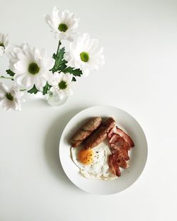Close-up of breakfast on white background