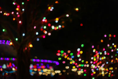 Defocused image of illuminated lights at night