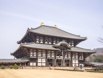 View of temple building against clear sky