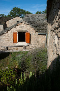 Stone cottage with slate roof in france