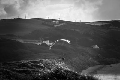 Scenic view of mountain against skysky paragliding 