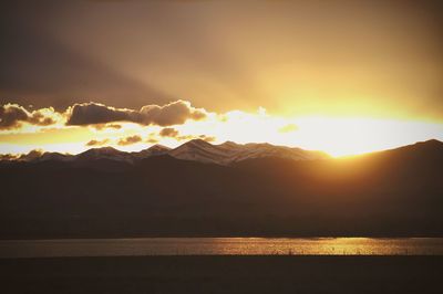 Sun shining through clouds