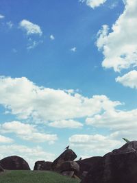 View of mountain range against cloudy sky