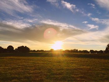 Scenic view of landscape at sunset