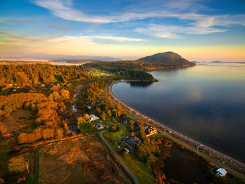 High angle view of sea against sky during sunset