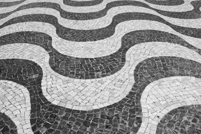 Full frame shot of curvy patterned footpath