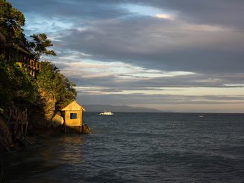 Lone boat in calm blue sea