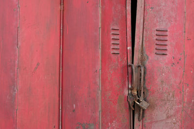 Full frame shot of rusty red door