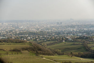 Aerial view of cityscape against sky