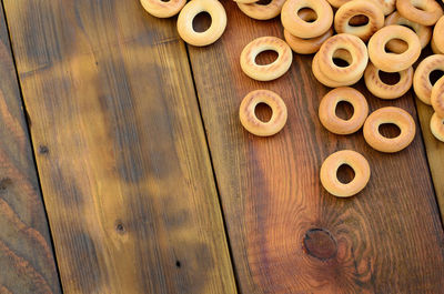 Directly above shot of donuts on wooden table