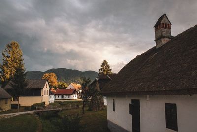 Exterior of old building by mountains against sky