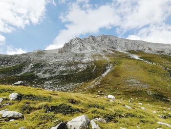 Scenic view of snowcapped mountains against sky